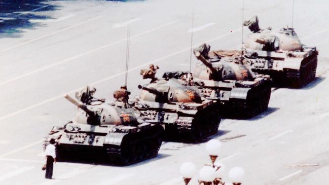 The famous image of a lone protester standing in front of tanks in Tiananmen Square during pro-democracy protests in June 1989.