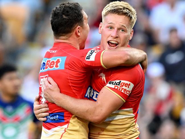 BRISBANE, AUSTRALIA - SEPTEMBER 02: Max Plath of the Dolphins celebrates with team mate Sean O'Sullivan after scoring a try during the round 27 NRL match between the Dolphins and New Zealand Warriors at Suncorp Stadium on September 02, 2023 in Brisbane, Australia. (Photo by Bradley Kanaris/Getty Images)