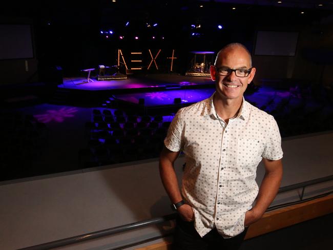 CityLife Church senior minister Andrew Hill inside the auditorium that holds 2000 people. Picture: Stuart Milligan