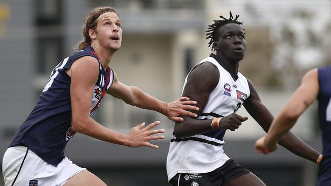 MELBOURNE, AUSTRALIA - APRIL 10: Jacob Edwards of the Dragons and Dominic Akuei of the Knights contest the ruck during the NAB League Boys match between the Northern Knights and the Sandringham Dragons at Preston City Oval on April 10, 2021 in Melbourne, Australia. (Photo by Cameron Grimes/AFL Photos)