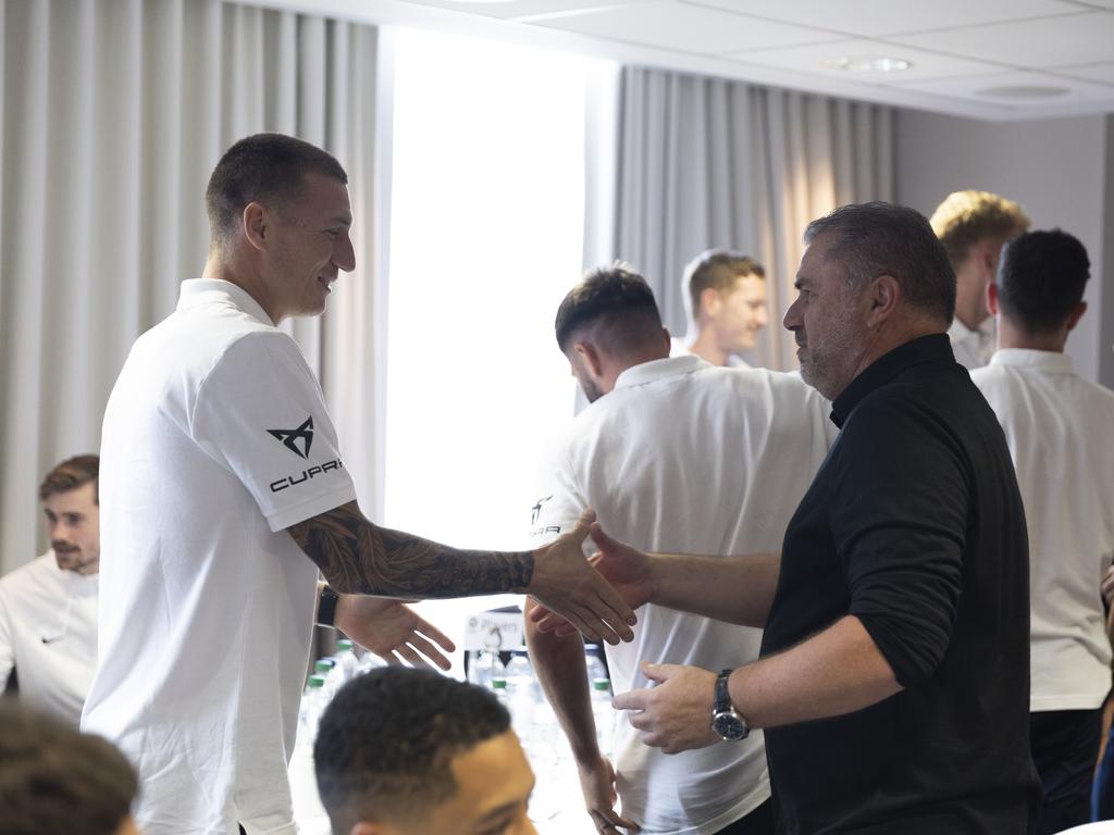 Socceroos striker Mitch Duke greets Ange Postecoglou. Picture: Football Australia/Aleksandar Jason