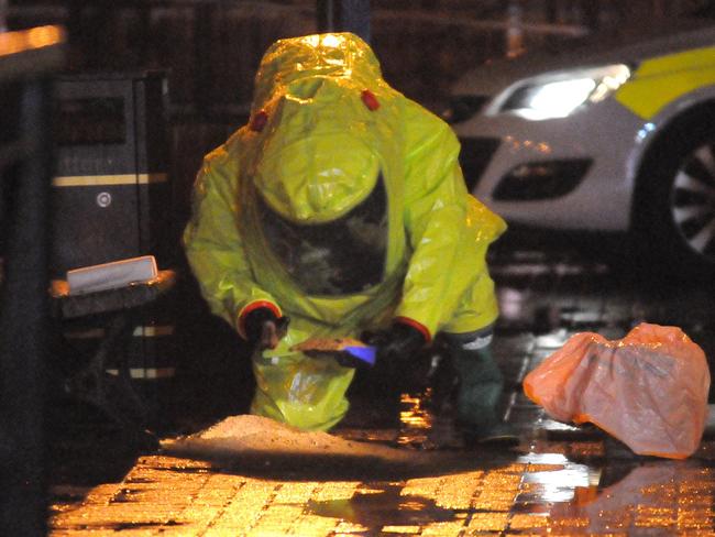 Firefighters and police near the shopping centre after the nerve gas attack. Picture: Salisbury Journal/Solent News.