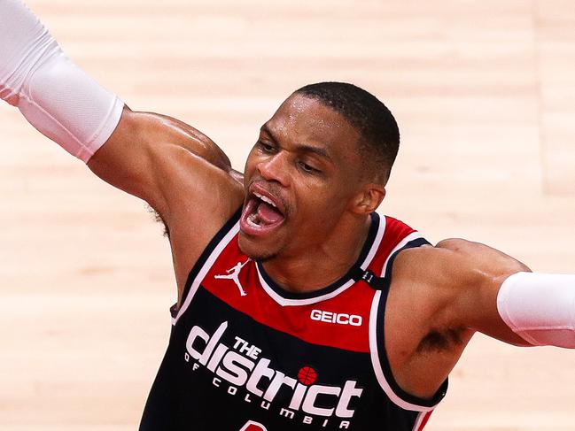 ATLANTA, GA - MAY 10: Russell Westbrook #4 of the Washington Wizards celebrates after scoring to cut lead with under a minute left in the fourth quarter of a game between the Washington Wizards and the Atlanta Hawks at State Farm Arena on May 10, 2021 in Atlanta, Georgia. NOTE TO USER: User expressly acknowledges and agrees that, by downloading and or using this photograph, User is consenting to the terms and conditions of the Getty Images License Agreement. (Photo by Casey Sykes/Getty Images)