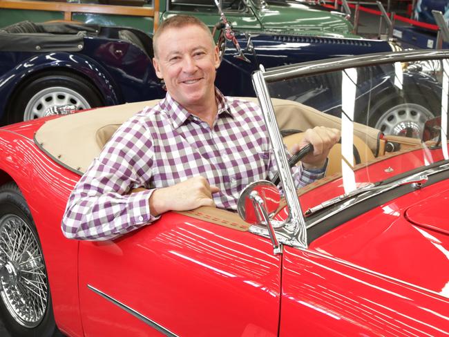 Millionaire Tony Denny at his car museum attraction in West Gosford. Picture by Mark Scott