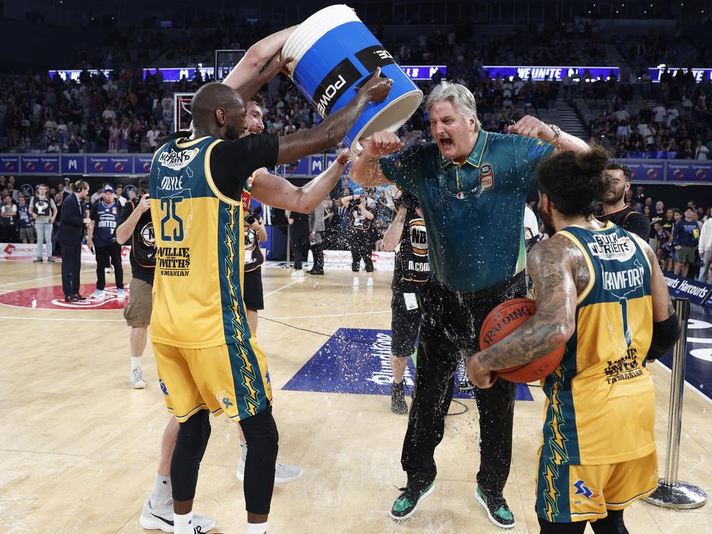 Tasmania coach Scott Roth cops a Gatorade shower. Picture: Getty Images