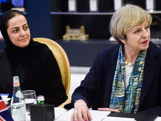 British Prime Minister Theresa May (R) attends a meeting with Sarah al-Suhaimi, CEO of the Saudi Stock Exchange (Tadawul) at the exchange in the capital Riyadh on April 4, 2017. / AFP PHOTO / POOL / FAYEZ NURELDINE