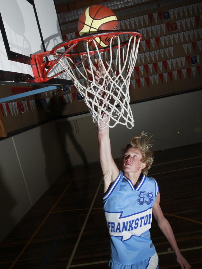 Mitch McCarthy shows off his basketball skills.