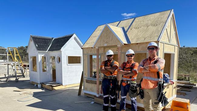 Six apprentices working on the Rookwood Weir project have worked to build two cubby houses for families in need.