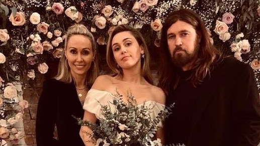 Miley with her parents on her wedding day. All three have wed well-known Aussies in recent years.