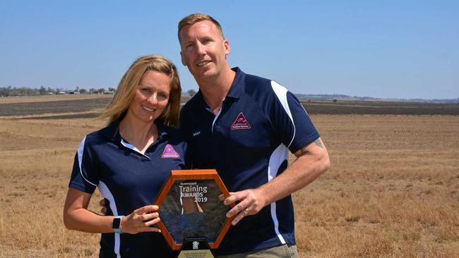 WINNERS: Astill's Electrical Services owners Amanda and Mick Astill with their Queensland Training Medium Employer award. Picture: Madeline Grace