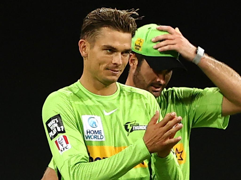 SYDNEY, AUSTRALIA - JANUARY 02:  Chris Green of the Thunder celebrates with team mates after winning the Men's Big Bash League match between the Sydney Thunder and the Adelaide Strikers at GIANTS Stadium on January 02, 2022, in Sydney, Australia. (Photo by Matt Blyth/Getty Images)