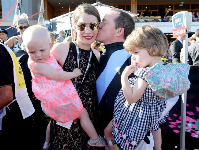 Stephen Baster with his family after winning the Group 1 classic. Picture: AAP