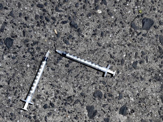 Needles in the street near where Premier Daniel Andrews announced an injecting room for North Richmond. Picture: Nicole Garmston