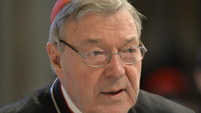 Australian Cardinal George Pell, Prefect of the Secretariat for the Economy of the Holy See arrives to attend a Chrism mass for Holy Thursday (Maundy Thursday) which marks the start of Easter celebrations on April 2, 2015 at St Peter's basilica in Vatican. AFP PHOTO / ANDREAS SOLARO