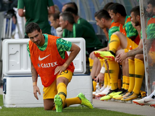 Jamie Maclaren warms up on the bench during the friendly game between the Socceroos and Czech Republic. Picture: Toby Zerna