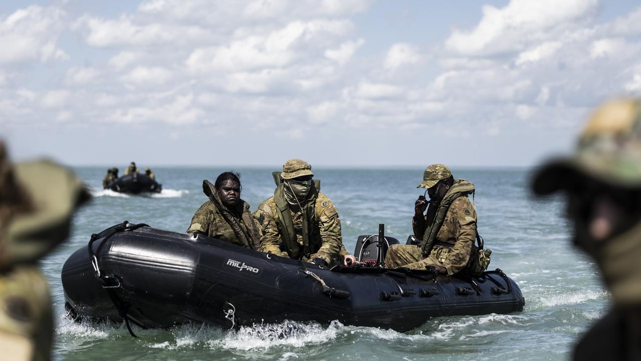 Soldiers in smaller Zodiac boats to conduct patrol around the Tiwi Islands. Picture: Dylan Robinson