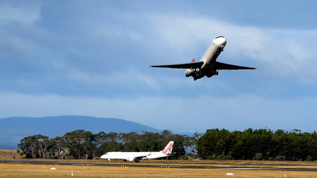 A Qantas plane takes off from Hobart Airport