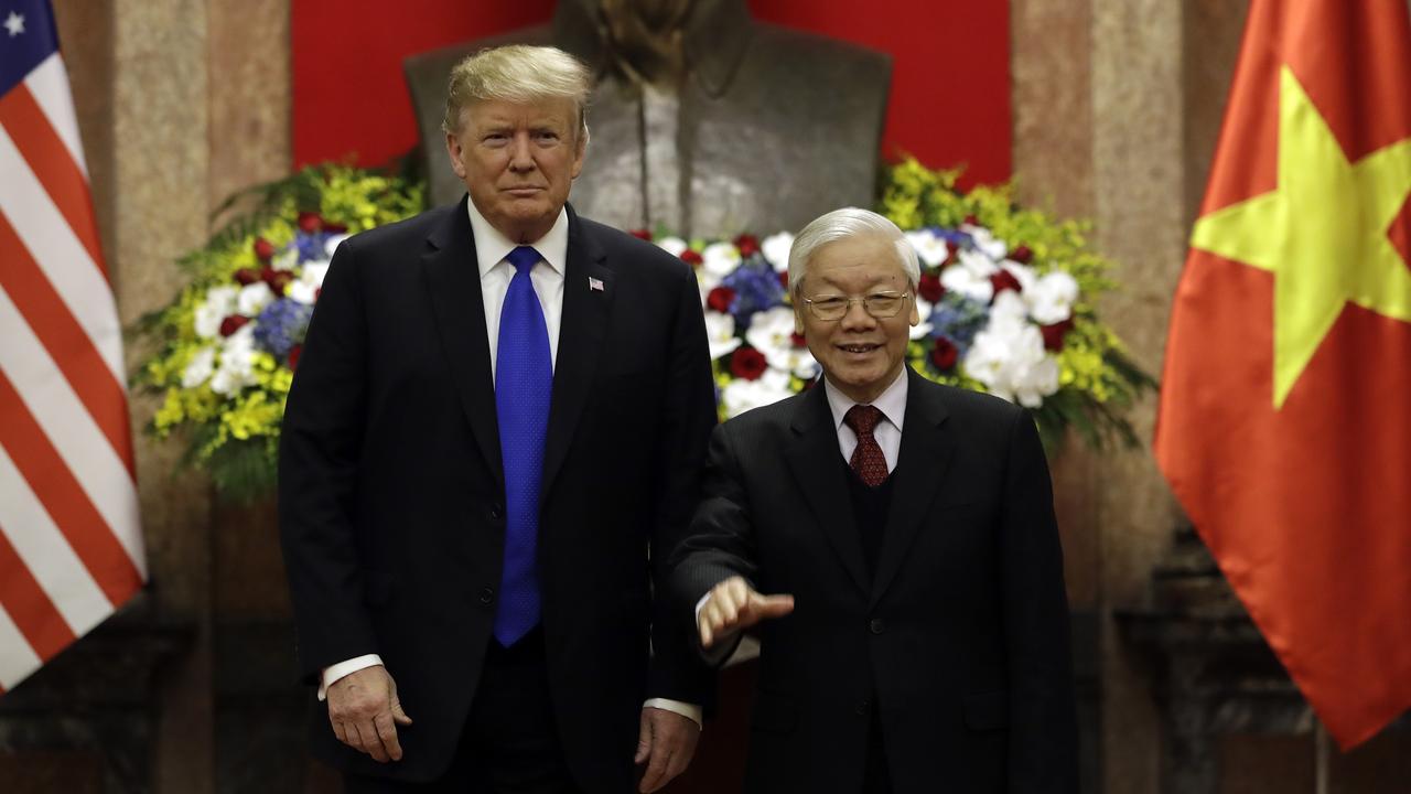 President Donald Trump meets Vietnamese President Nguyen Phu Trong at the Presidential Palace in Hanoi.