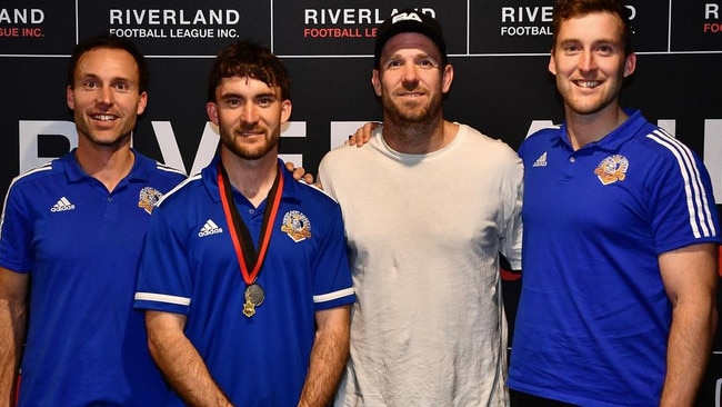 Dan Woolford (middle, left) with awards presenter Dane Swan, and Matt (left) and Tim Woolford. Picture: Grant Schwartzkopff