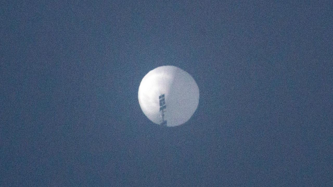 The Chinese balloon flew at an altitude of around 18km. Pictured here in the sky over Montana. Picture: Chase Doak/AFP