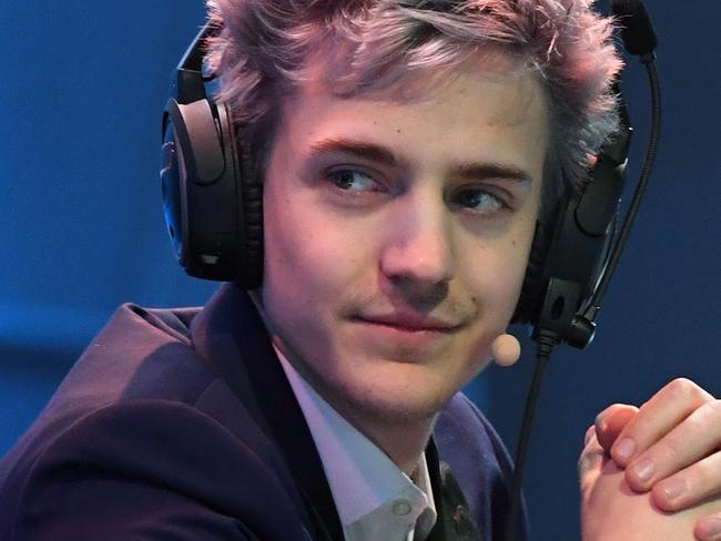 LAS VEGAS, NV - APRIL 21: Twitch streamer and professional gamer Tyler "Ninja" Blevins streams during Ninja Vegas '18 at Esports Arena Las Vegas on April 21, 2018 in Las Vegas, Nevada. Blevins is playing against more than 230 challengers in front of 700 fans in 10 live "Fortnite" games with up to USD 50,000 in cash prizes on the line. He is donating all his winnings to the Alzheimer's Association.   Ethan Miller/Getty Images/AFP == FOR NEWSPAPERS, INTERNET, TELCOS & TELEVISION USE ONLY ==