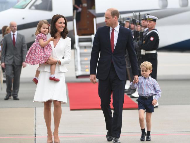 This file photo taken on July 17, 2017 shows Britain's Prince William, Duke of Cambridge (R) and his wife Kate, Duchess of Cambridge (L) with their children Prince George and Princess Charlotte. Picture: AFP.