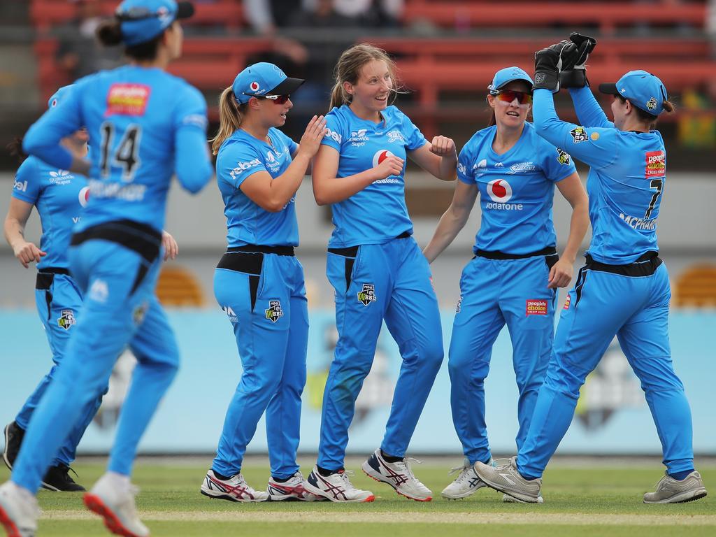 Adelaide Strikers young quick Darcie Brown celebrates a wicket with teammates. Picture: Getty