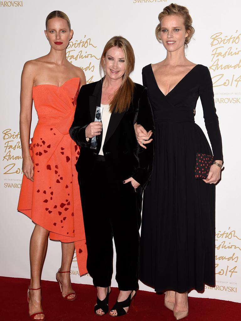 Accessory designer Anya Hindmarch (C) poses with Karolina Kurkova (L) and Eva Herzigova in the winners room at the British Fashion Awards at London Coliseum on December 1, 2014 in London. Picture: Getty