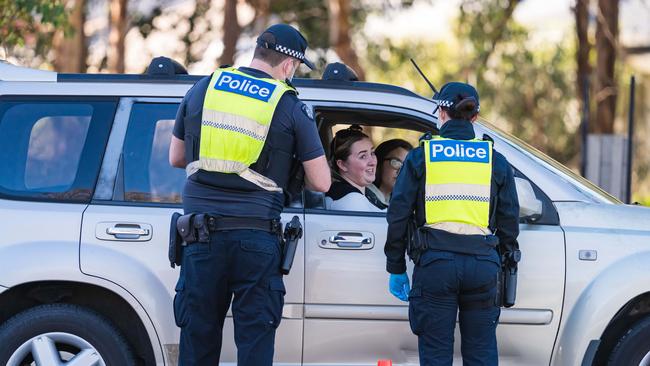 Police perform a spot check near Wodonga. Picture: Simon Dallinger