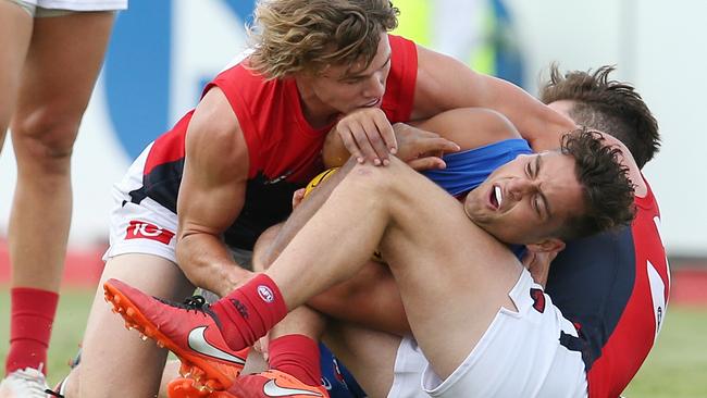 Luke Dahlhaus gets gang tackled. Picture: Michael Klein