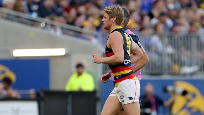 The Crows lost Rory Sloane after he copped some friendly fire from Matt Crouch. Pic: AAP