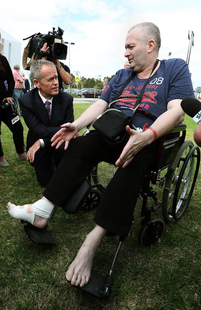 Former CFA Volunteer Rob Gibbs speaking to Mr Shorten. Picture: Kym Smith