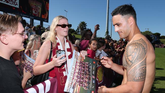 Valentine Holmes signs autographs. Picture Lachie Millard