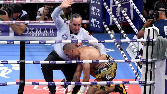 The referee calls off the 2018 bout between Jeff Horn and Anthony Mundine after the latter was knocked down. Picture: AAP Image