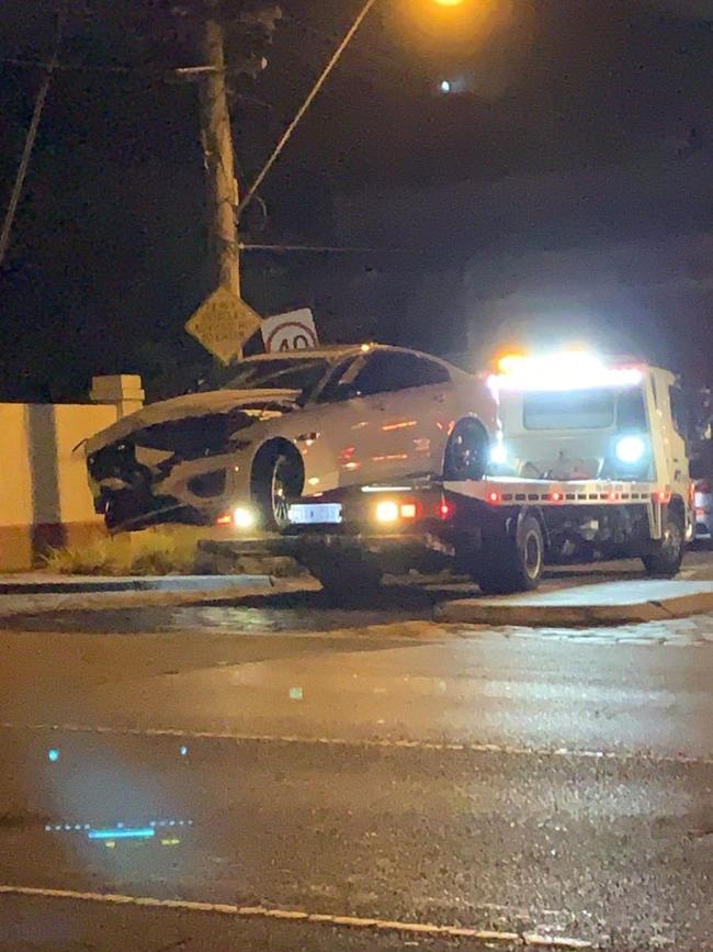 Tim Smith’s car is towed from the scene in Hawthorn. Picture: Olivia and Charlotte Neish