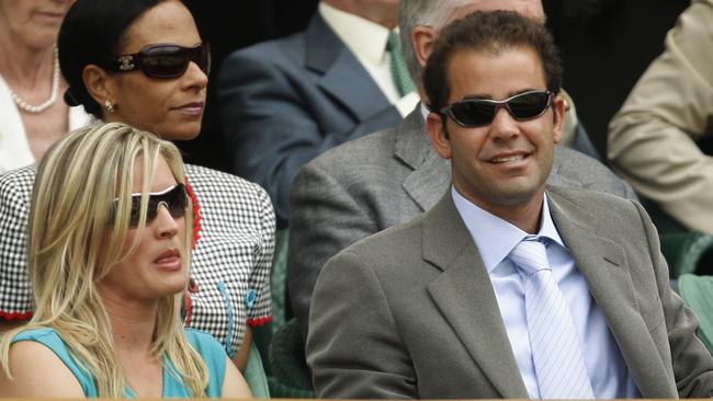 Former champion Pete Sampras and his wife Bidgette at Wimbledon.