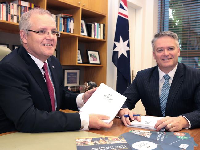 CANBERRA, AUSTRALIA - MAY 09:  Treasurer Scott Morrison poses in his office with Minister for Finance Mathias Cormann prior to the release of the 2017 Budget on May 9, 2017 in Canberra, Australia. The treasurer will identify key areas including using pre-income tax to assist first home buyers, details on the Western Sydney Airport and funding to assist with schools.  (Photo by Stefan Postles/Getty Images)