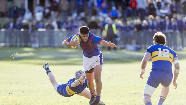 Jaycriyzel Patelesio-Faamausili of Downlands evades a tackle in O'Callaghan Cup on Grammar Downlands Day at Toowoomba Grammar School, Saturday, August 19, 2023. Picture: Kevin Farmer