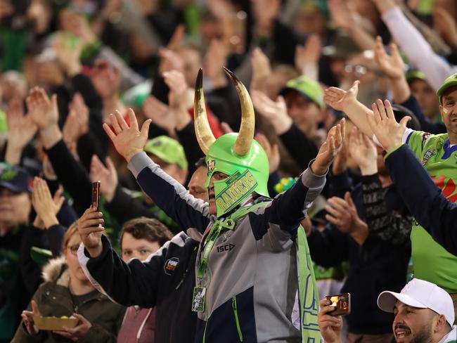 Canberra fans perform the Viking clap during the Canberra Raiders v South Sydney Preliminary NRL Final at GIO Stadium, Canberra.