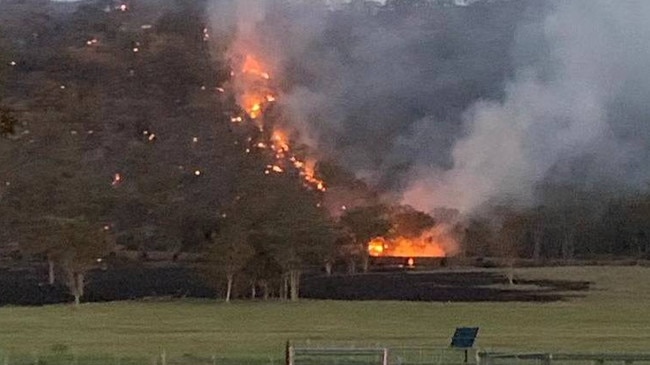 Access to the derailment site was hampered by a grass fire.