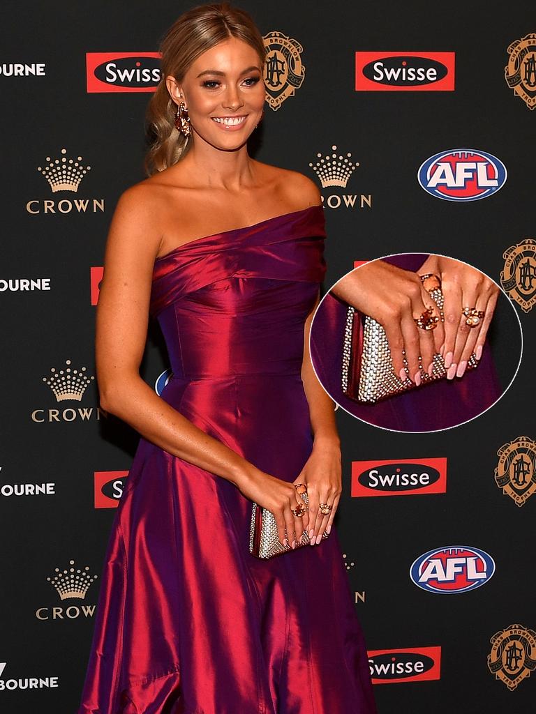 Alice Gough: Striking hued Georgia Young gown teamde with sparkly clutch and hand bling. Photo: AAP Image/Julian Smith