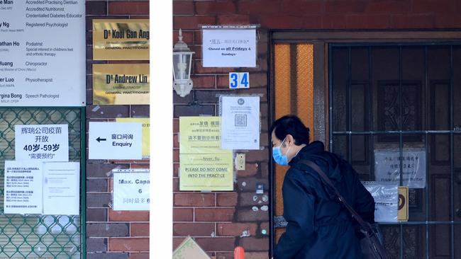 A man walks out of the Blessed Health Care clinic in Campsie where they are charging hundreds to get the Pfizer jab. Picture: NCA NewsWire / Damian Shaw