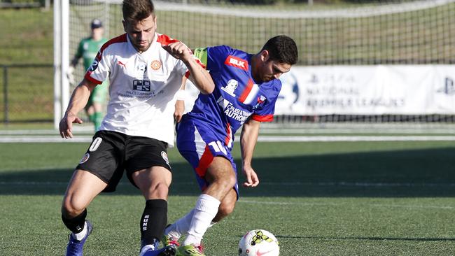 Manly's Brendan Cholakian with the ball.