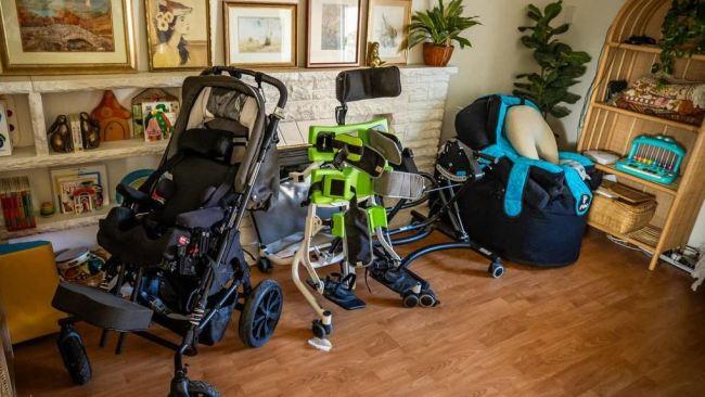 L-R: Cassian’s wheelchair, walking aide and supportive chair. Picture: Tom Huntley