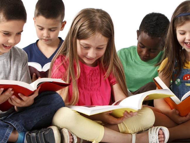 istock. Group of kids reading