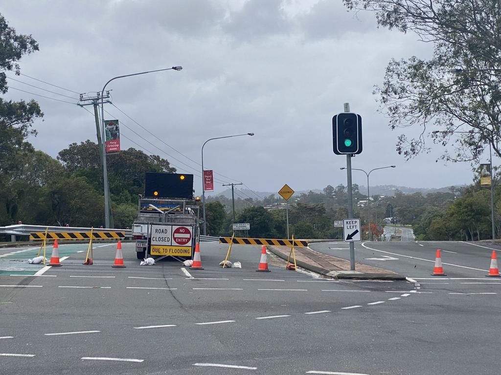 Flooding at Somerset Drive in Mudgeeraba has closed the road. Picture: Lea Emery