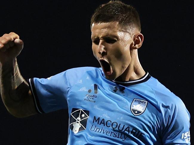 SYDNEY, AUSTRALIA - MARCH 01: Patryk Klimala of Sydney FC celebrates kicking a goal during the round 21 A-League Men match between Macarthur FC and Sydney FC at Campbelltown Stadium, on March 01, 2025, in Sydney, Australia. (Photo by Cameron Spencer/Getty Images)