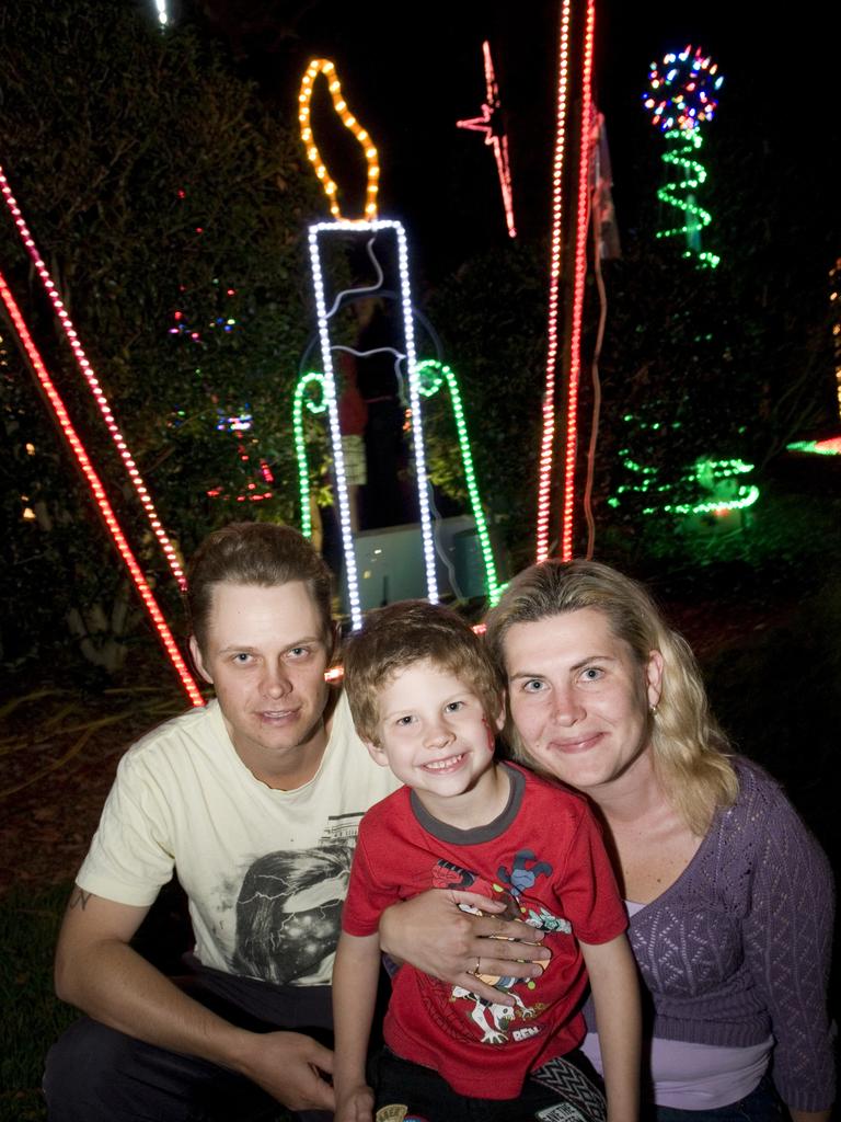 (From left) Garry, Lachlan and Renee Wright at Toowoomba's Christmas Wonderland in Queens Park, Saturday, December 03, 2011. Photo Kevin Farmer / The Chronicle