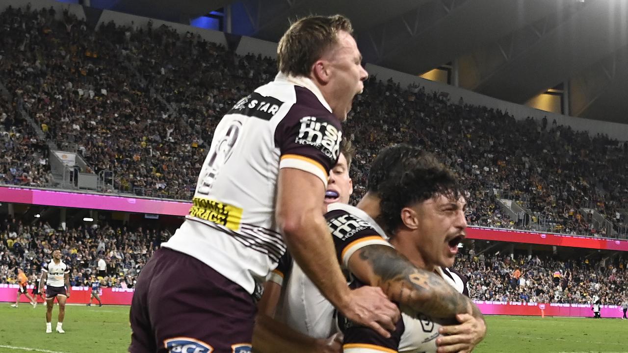 TOWNSVILLE, AUSTRALIA - AUGUST 10: Kotoni Staggs of the Broncos celebrates after scoring a try during the round 23 NRL match between North Queensland Cowboys and Brisbane Broncos at Qld Country Bank Stadium, on August 10, 2024, in Townsville, Australia. (Photo by Ian Hitchcock/Getty Images)