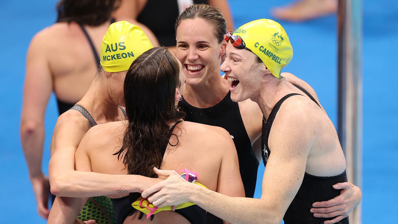TOKYO, JAPAN - JULY 25: Emma McKeon, Bronte Campbell, Meg Harris and Cate Campbell of Team Australia celebrate after winning the gold medal in the Women's 4 x 100m Freestyle Relay Final on day two of the Tokyo 2020 Olympic Games at Tokyo Aquatics Centre on July 25, 2021 in Tokyo, Japan. (Photo by David Ramos/Getty Images)